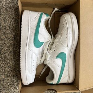 Teal swish Nike Court Vision